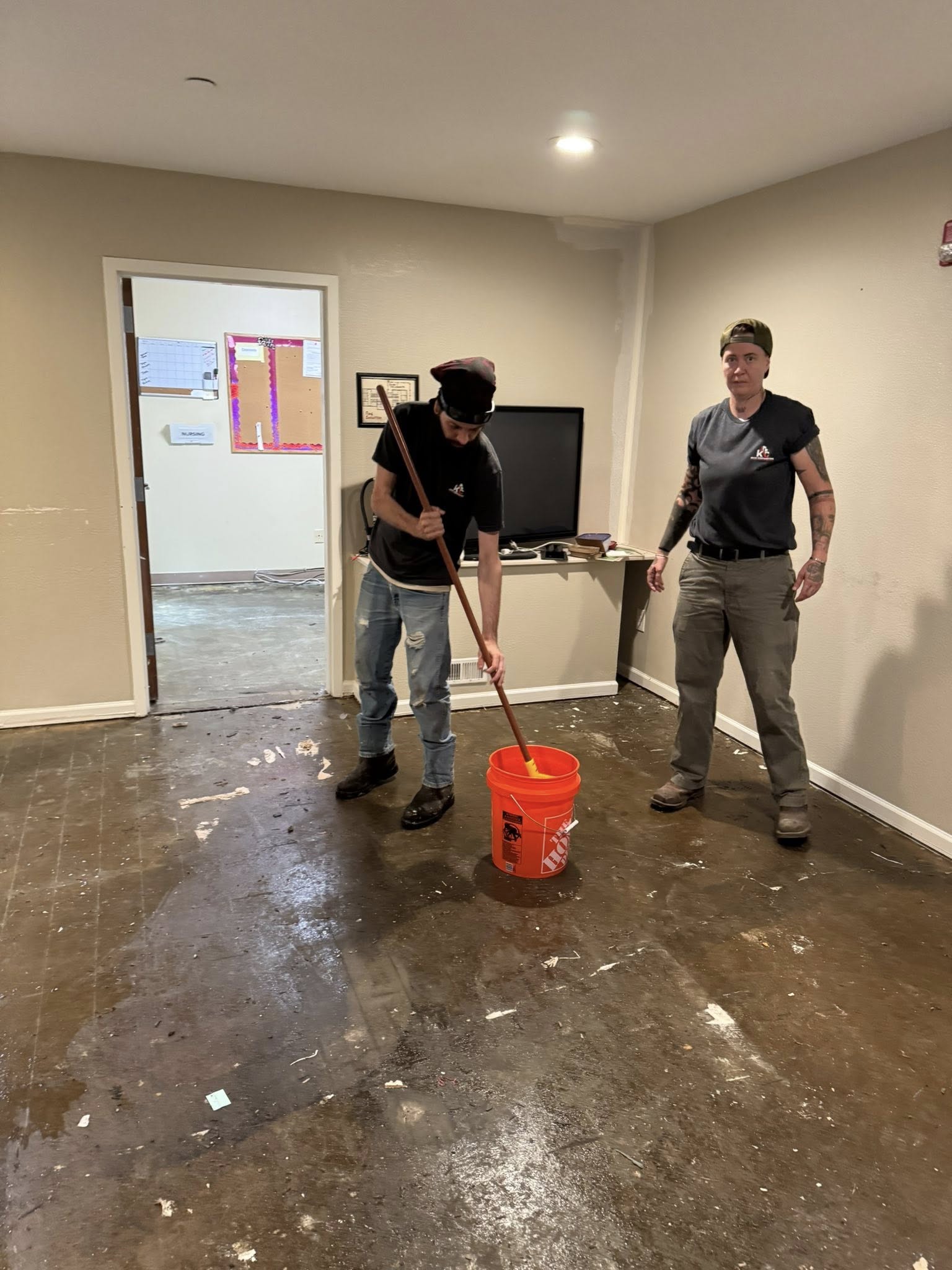 Team cleaning commercial space